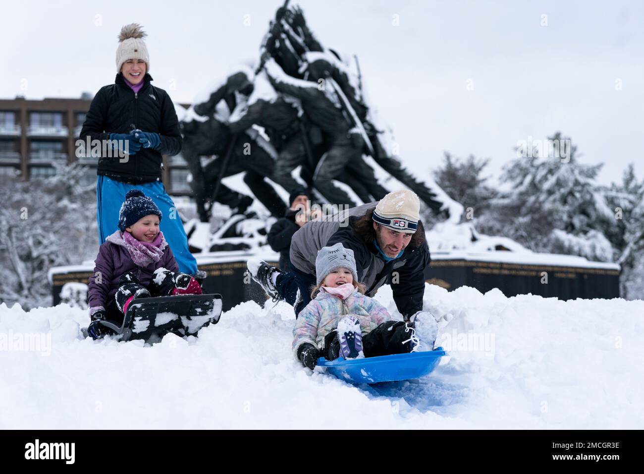 Courtney Davison, top left, with her daughter Aubrey Davison watch as