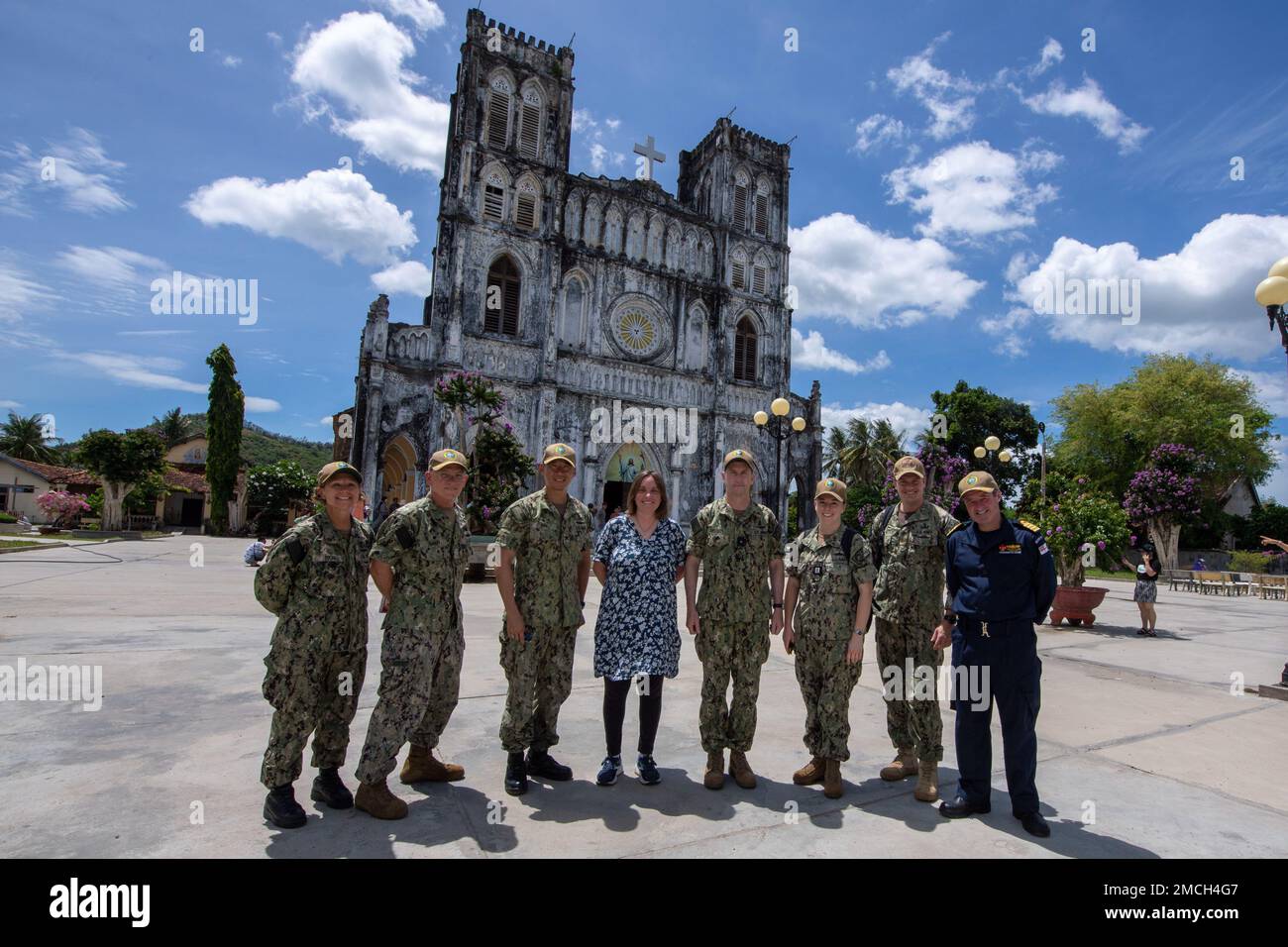 TUY HOA, VIETNAM (July 2, 2022) – Members of Pacific Partnership 2022 pose for a photo at Mang Lang Church during Pacific Partnership 2022. Now in its 17th year, Pacific Partnership is the largest annual multinational humanitarian assistance and disaster relief preparedness mission conducted in the Indo-Pacific. Stock Photo