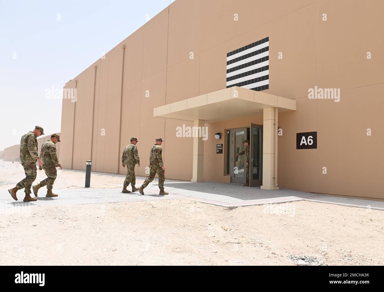 379th Air Expeditionary Wing leadership approaches a newly finished