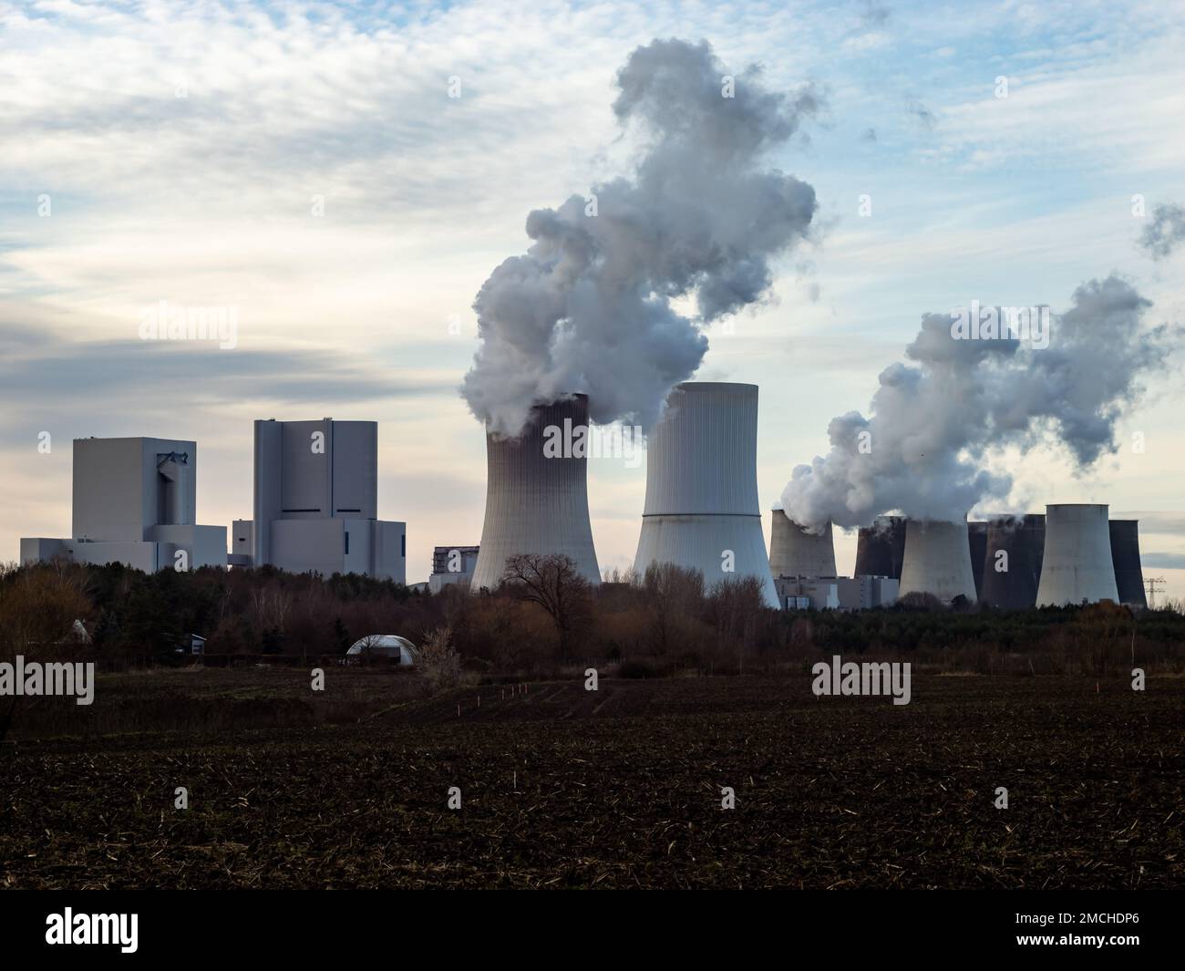 Lignite fired power plant with an empty agricultural field in front