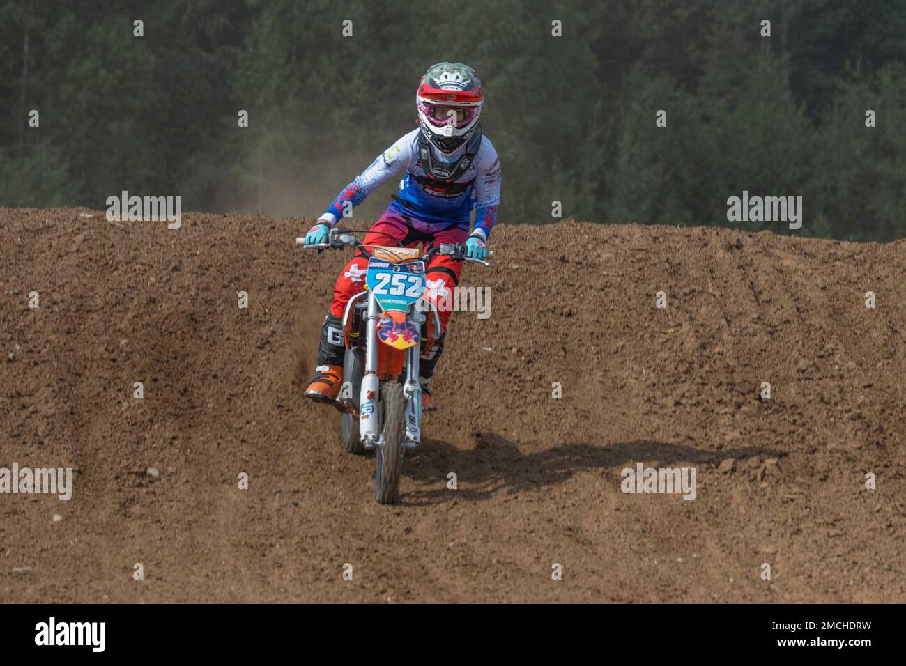 SHARYA, RUSSIA - AUGUST 06, 2022: Young rider on motocross motorcycle on motocross track. Cup dedicated to the memory of L.A. Voronin Stock Photo