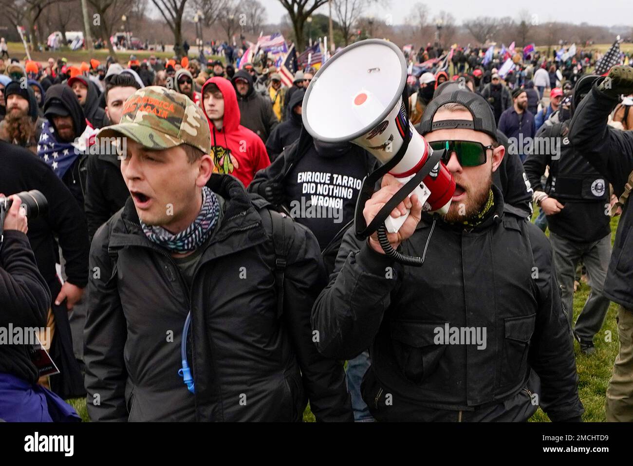 FILE - Proud Boys members Zachary Rehl, left, and Ethan Nordean, left, walk  toward the U.S. Capitol in Washington, in support of President Donald Trump  on Jan. 6, 2021. A federal judge