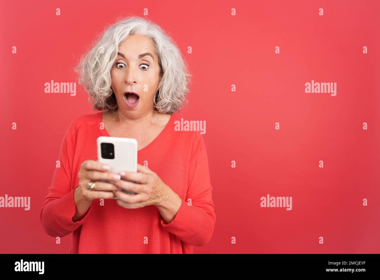 Confident mature woman typing hi-res stock photography and images - Alamy