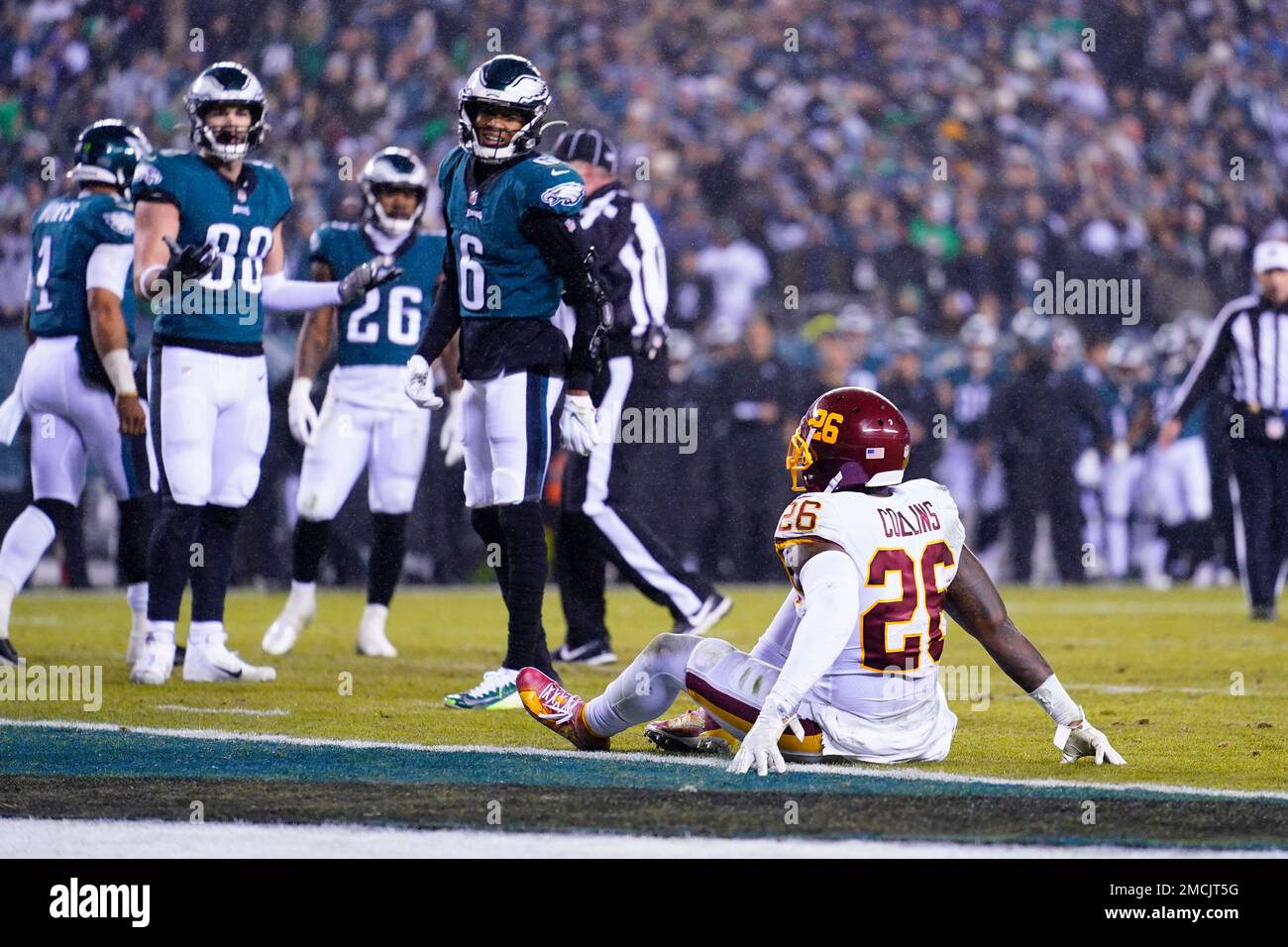 Washington Football Team's Landon Collins, right, is injured during the  first half of an NFL football game against the Philadelphia Eagles,  Tuesday, Dec. 21, 2021, in Philadelphia. (AP Photo/Matt Rourke Stock Photo 