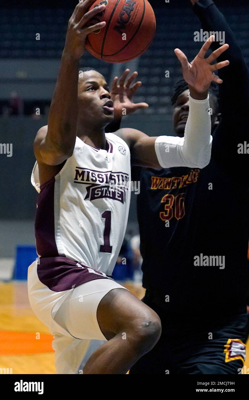 Mississippi State guard Iverson Molinar (1) drives for a layup past the defense of Winthrop