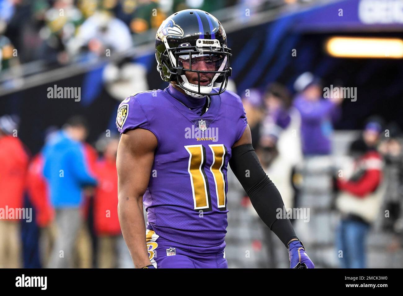 Baltimore Ravens wide receiver James Proche (11) looks on during pre-game  warm-ups before an NFL football game against the Green Bay Packers, Sunday,  Dec. 19, 2021, in Baltimore. (AP Photo/Terrance Williams Stock