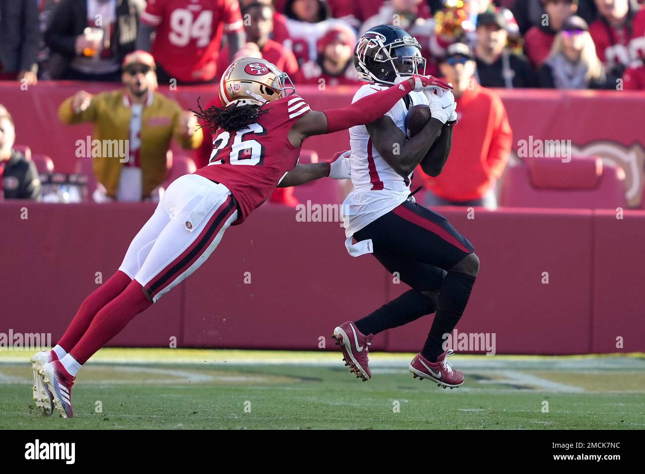 Atlanta Falcons wide receiver Olamide Zaccheaus, right, catches a