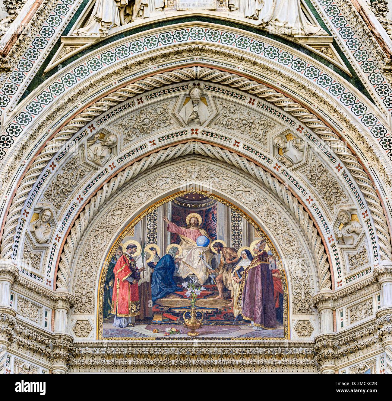 Central tympanum mosaic of Jesus Christ at the Duomo Cathedral or Cattedrale di Santa Maria del Fiore, Florence, Italy known for the Brunelleschi dome Stock Photo