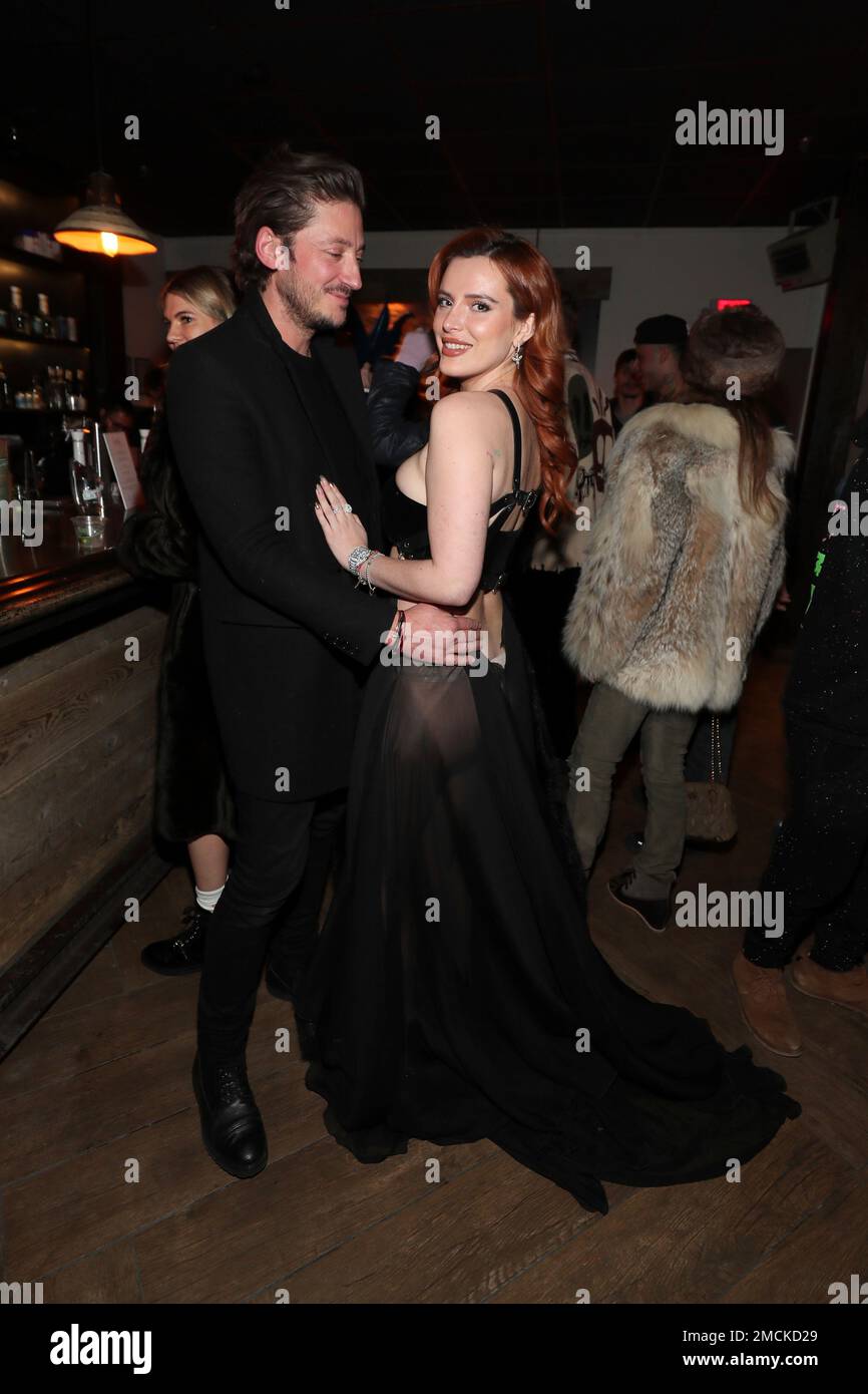 Actor Bella Thorne, right, and Mark Emms, left, pose at the “Divinity