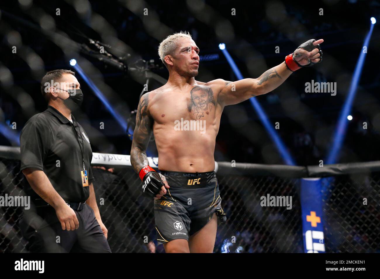 Charles Oliveira reacts after defeating Dustin Poirier, not pictured