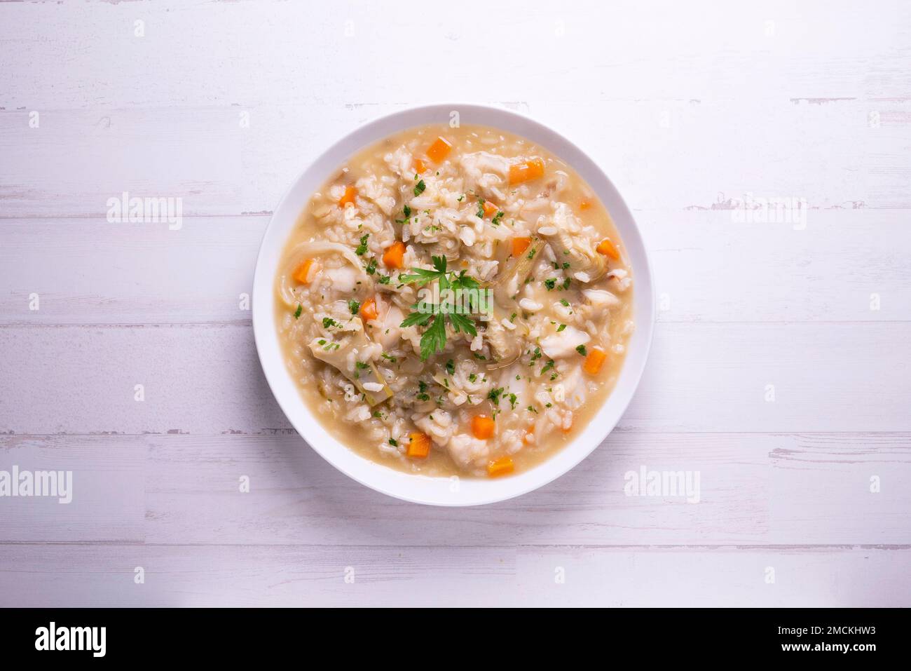 Original spanish soupy rice recipe with chicken and vegetables Stock Photo Alamy