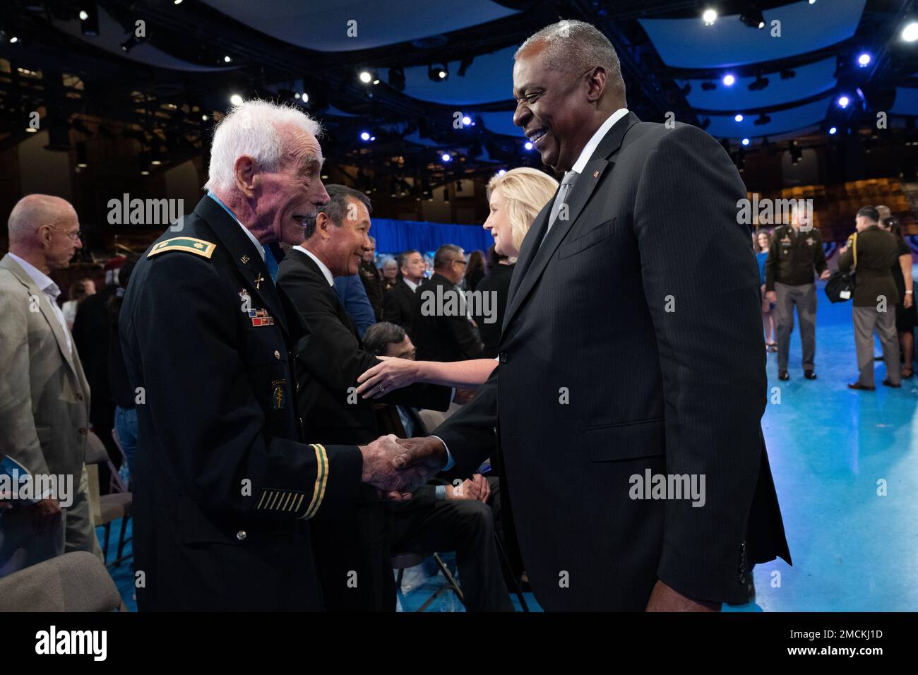 Secretary of Defense Lloyd J. Austin III greets Medal of Honor recipient retired Army Maj. John J. Duffy after the ceremony in which Duffy and five other Medal of Honor recipients were inducted into the Pentagon Hall of Heroes, at Joint Base Myer-Henderson Hall, Va., July 6, 2022. (DoD photo by Lisa Ferdinando) Stock Photo