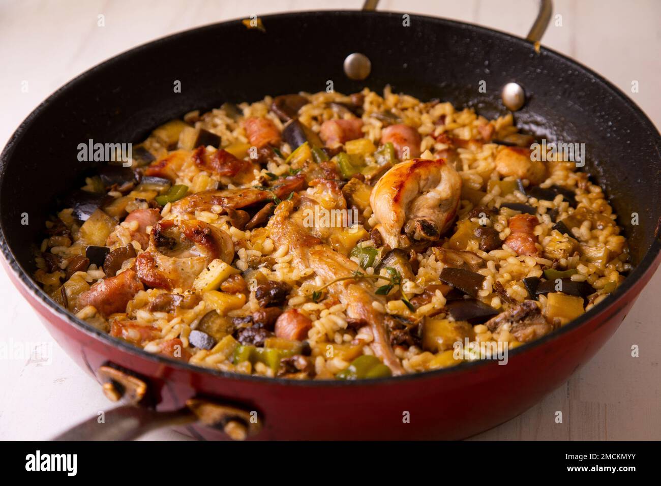 Original spanish paella recipe with rabbit, pork and vegetables Stock