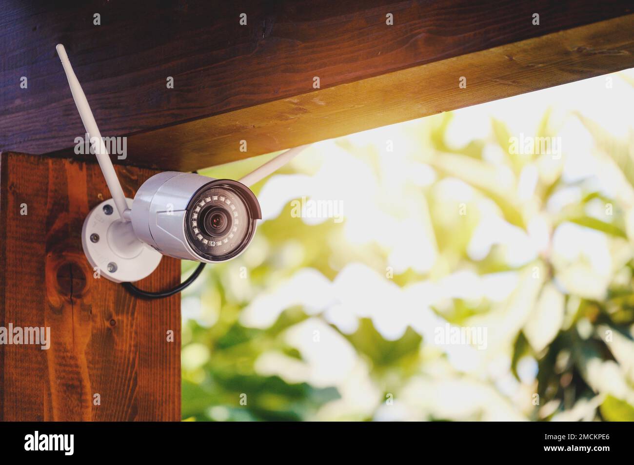 Wireless ip camera monitors an house to prevent theft Stock Photo