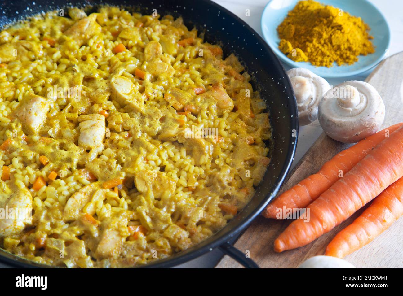 Chicken curry paella with vegetables. Authentic Paella spanish recipe