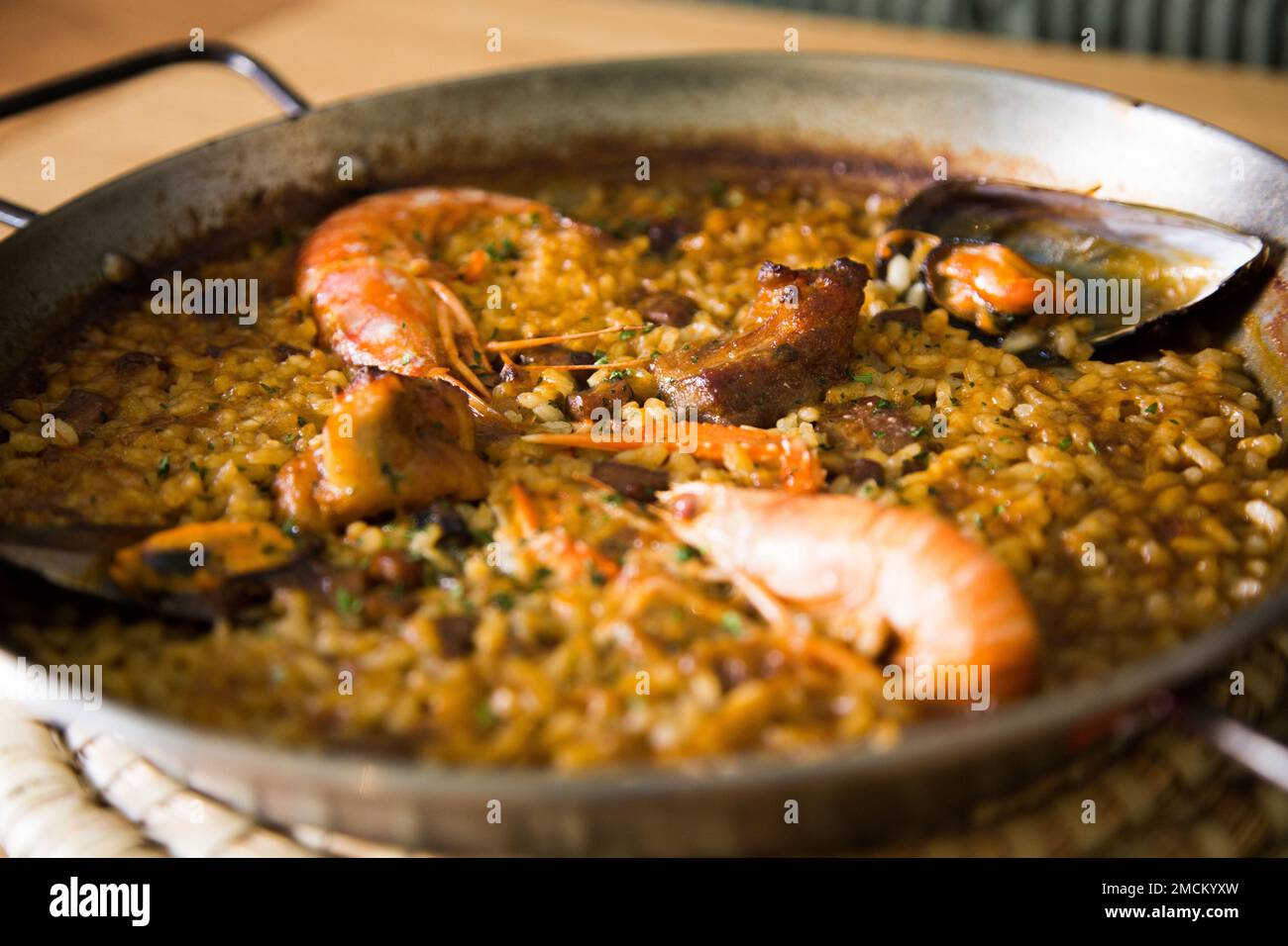 Seafood paella with mussels, prawns and clams. Authentic Paella spanish
