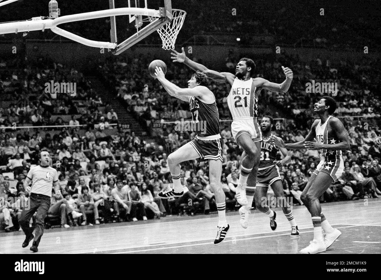 FILE - Boston Celtics John Havlicek on the way to a basket as New