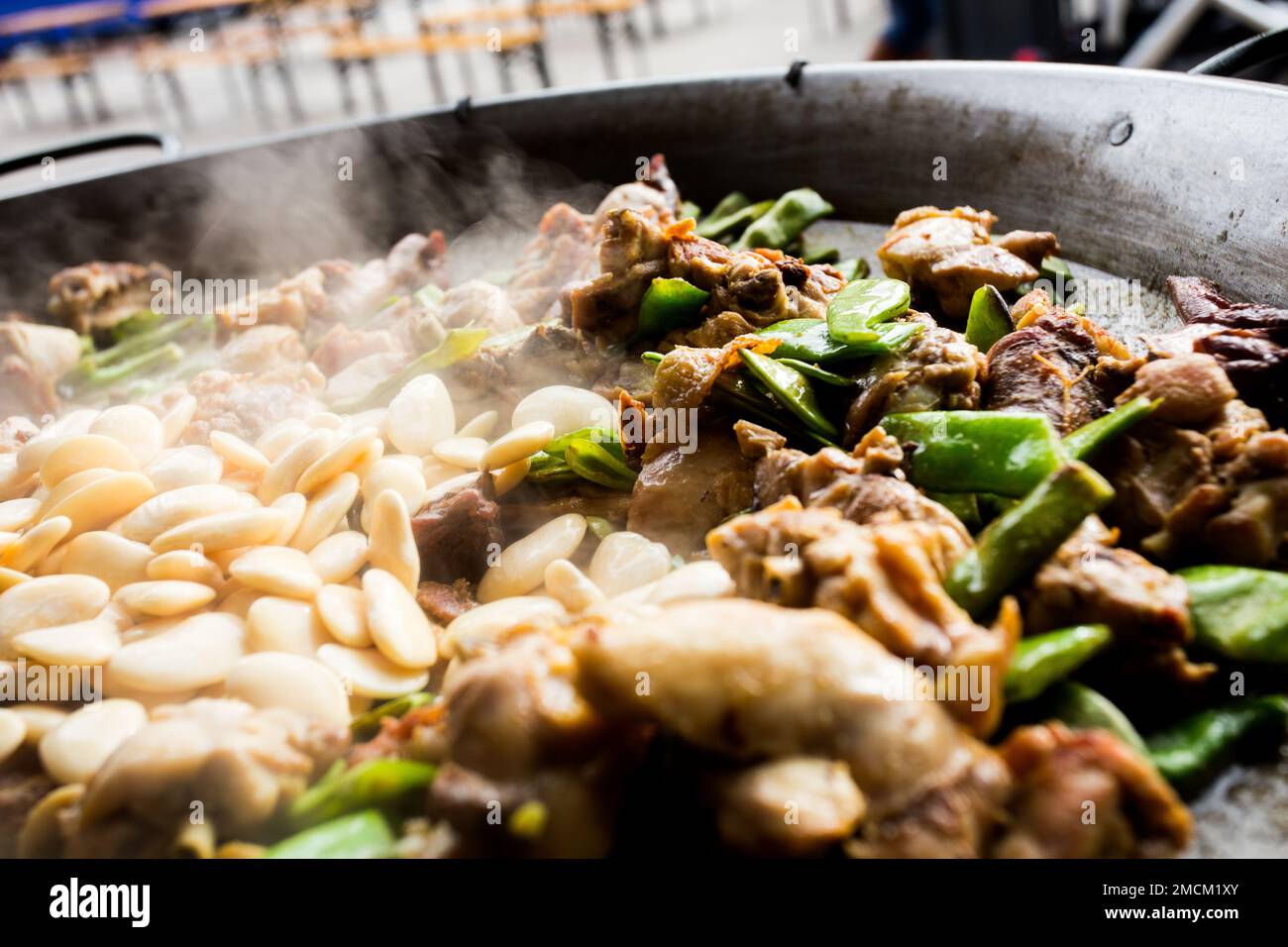 Paella Valenciana with vegetables, chicken and wild rabbit. Authentic Paella spanish recipe