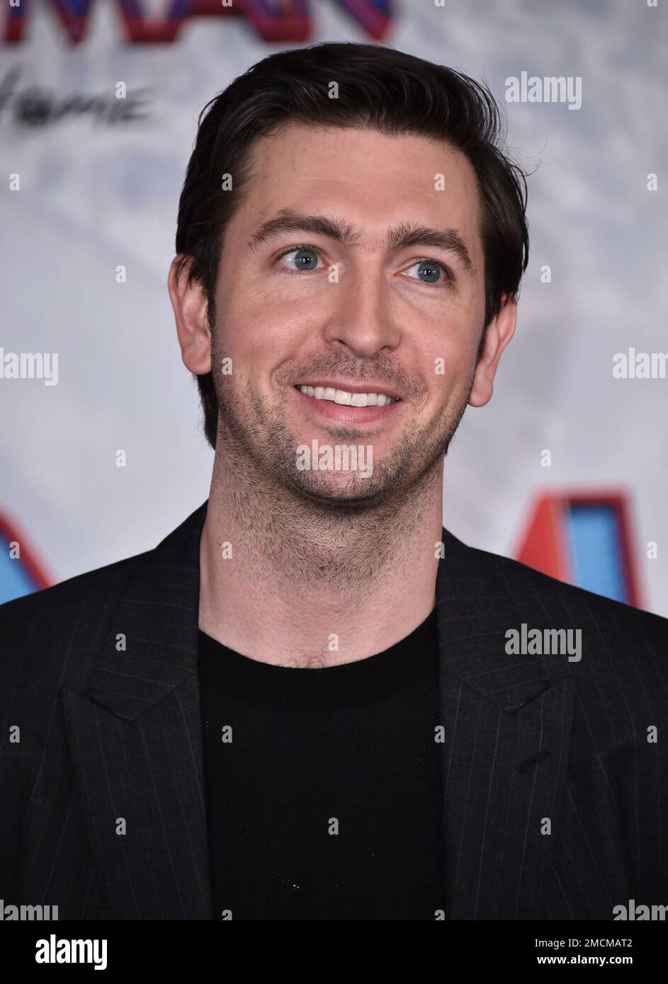 Nicholas Braun arrives at the premiere of "SpiderMan No Way Home" at