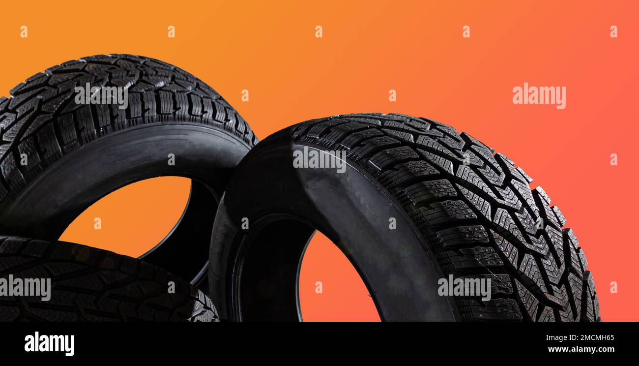 Car winter tire on colored Stock Photo