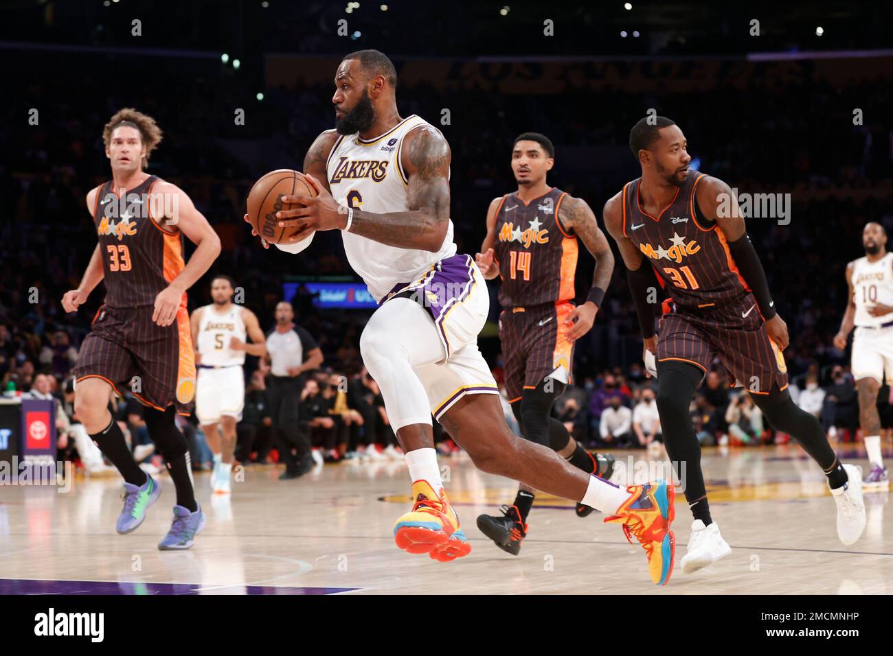 Los Angeles Lakers forward LeBron James (6) drives past the Orlando