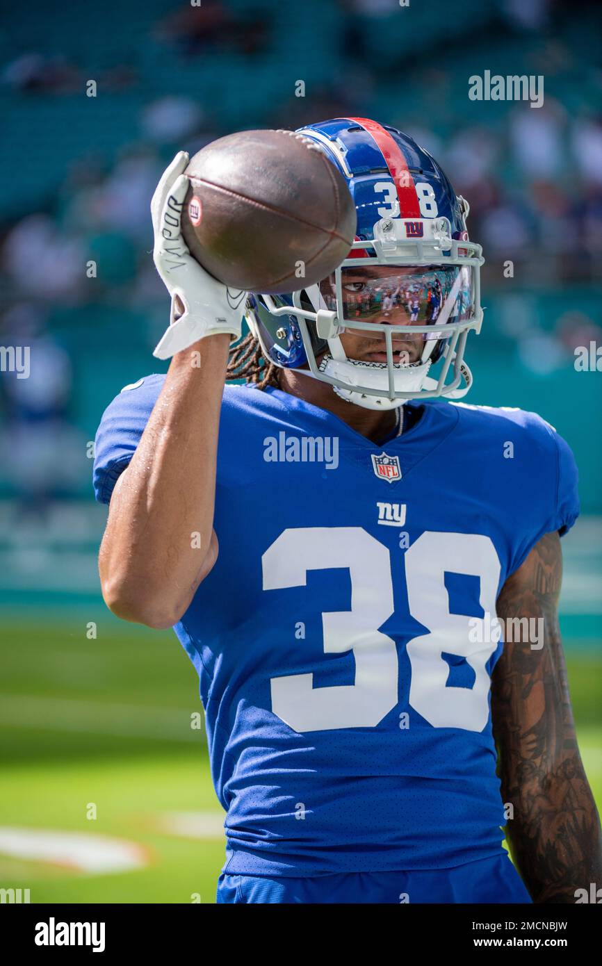 New York Giants defensive back Steven Parker (38) holds a football on
