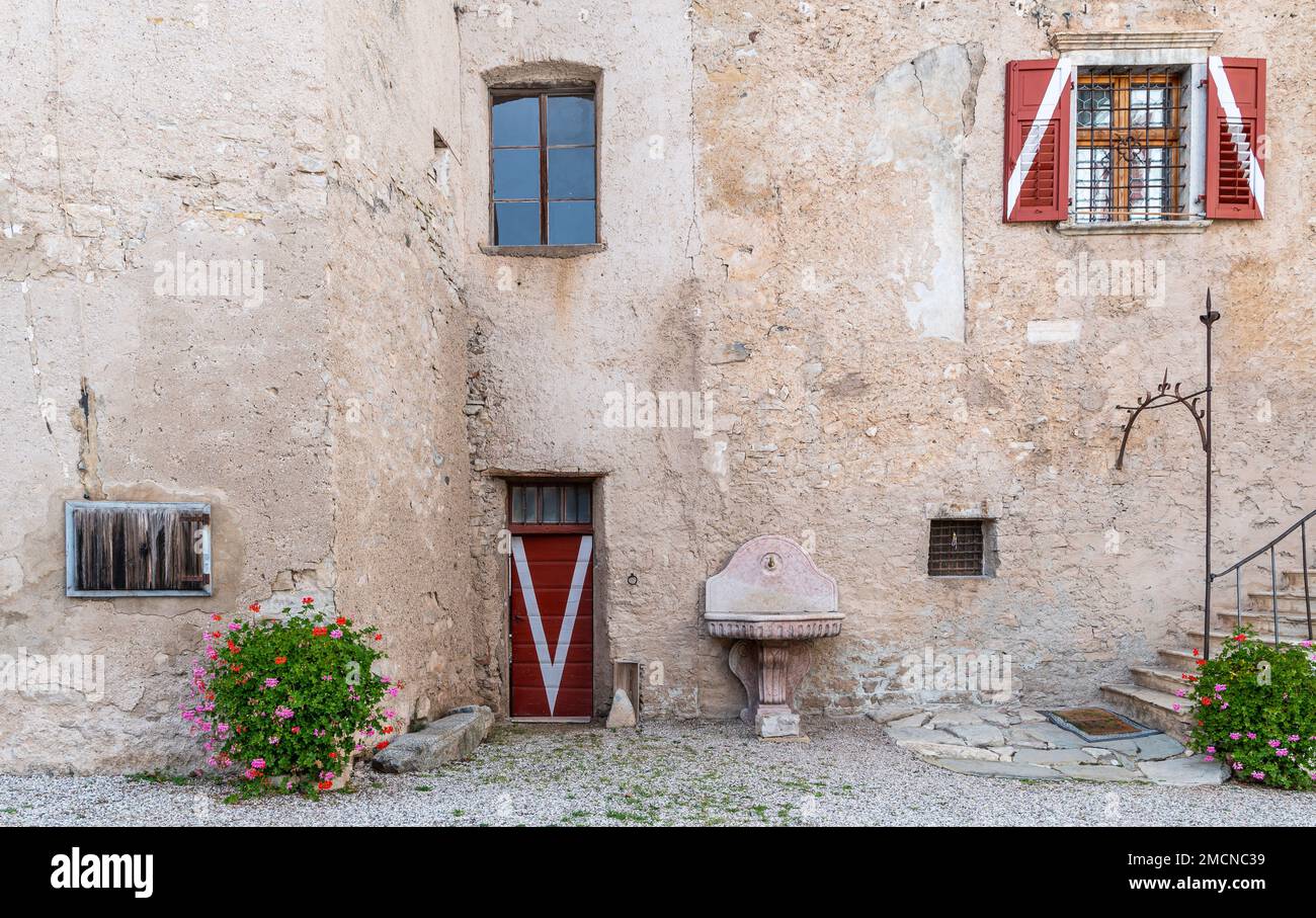The medieval Casez Castle (or Palazzo Concini) XV century details of the facade, Sanzeno, Non