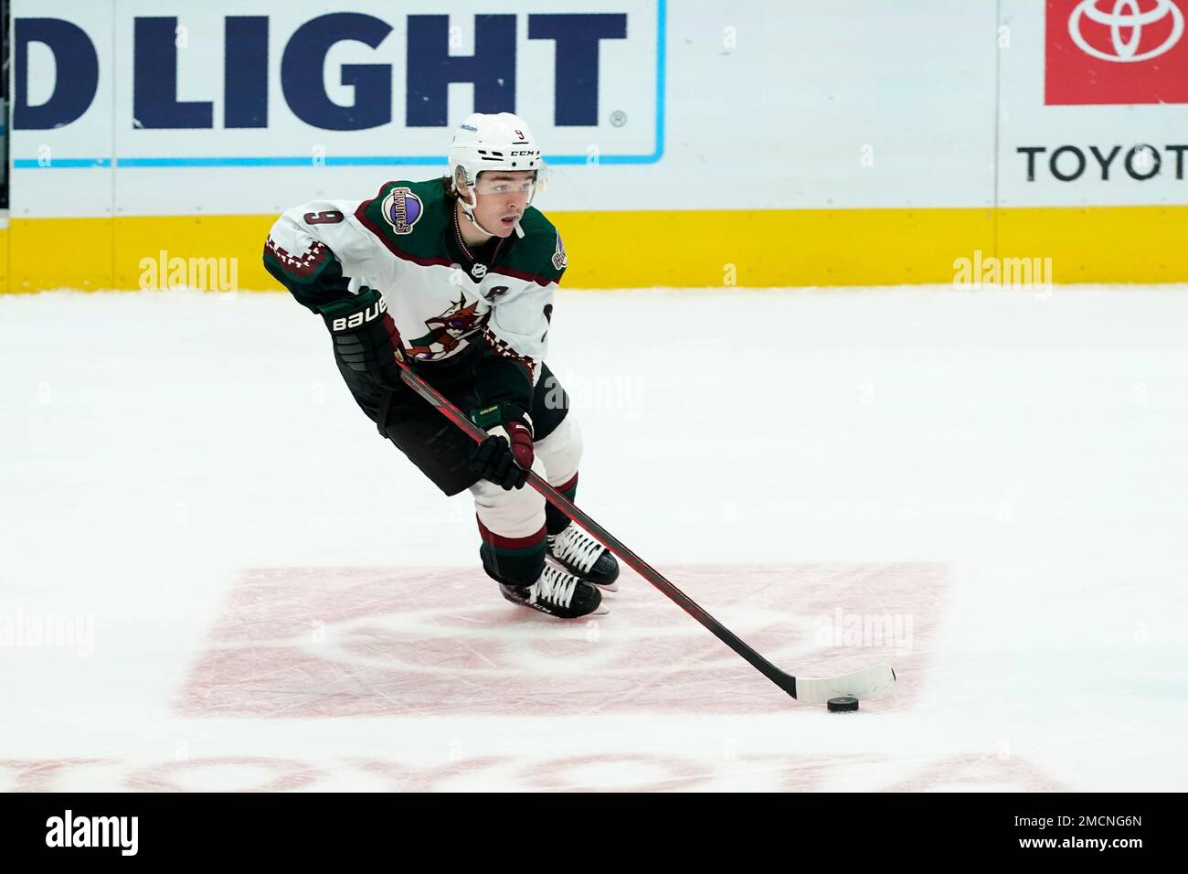 Arizona Coyotes right wing Clayton Keller skates to the puck against the  New York Rangers during the second period of an NHL hockey game Thursday,  Dec. 16, 2021, in Glendale, Ariz. The