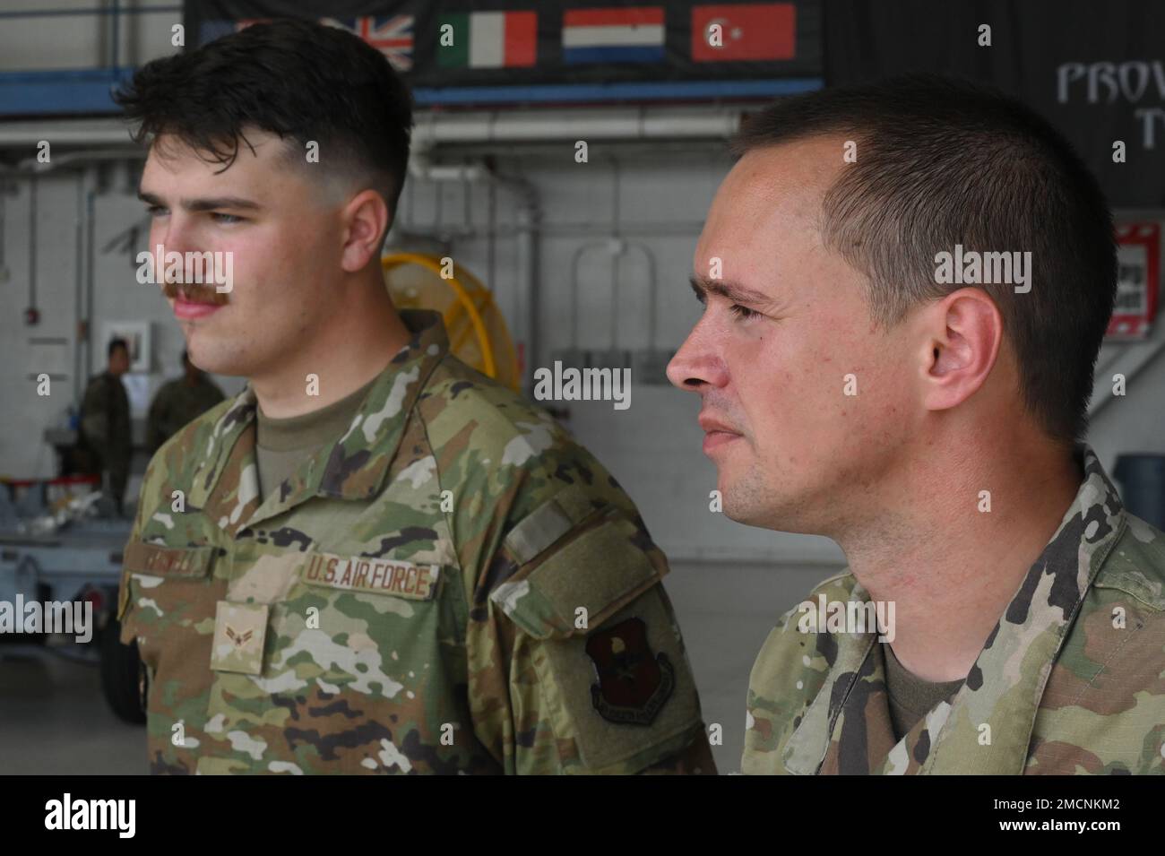 U.S.Air Force Airman 1st Class Rodney Powell, left, an assistant