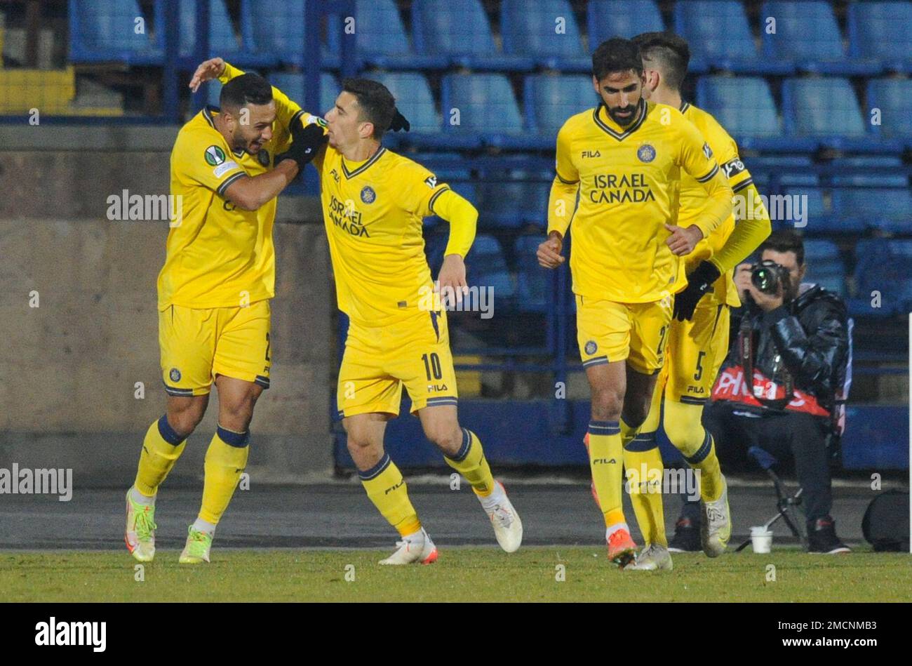Maccabi Tel Aviv's Eylon Almog, left, celebrates with teammates after  scoring his side's first goal during a group A Europa Conference League  soccer match between Alashkert and Maccabi Tel Aviv at the