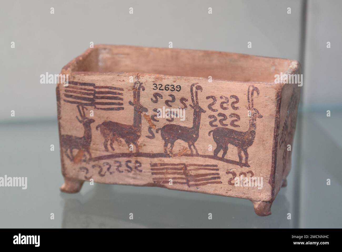 Egyptian box with antilopes and fish (middle predynastic) at the British Museum, London, UK Stock Photo