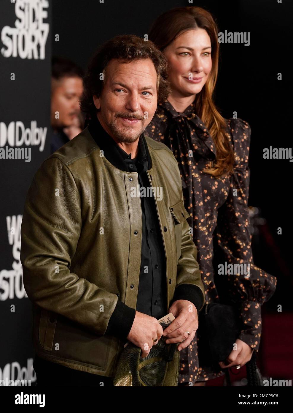 Pearl Jam singer Eddie Vedder and his wife Jill McCormick arrive at the