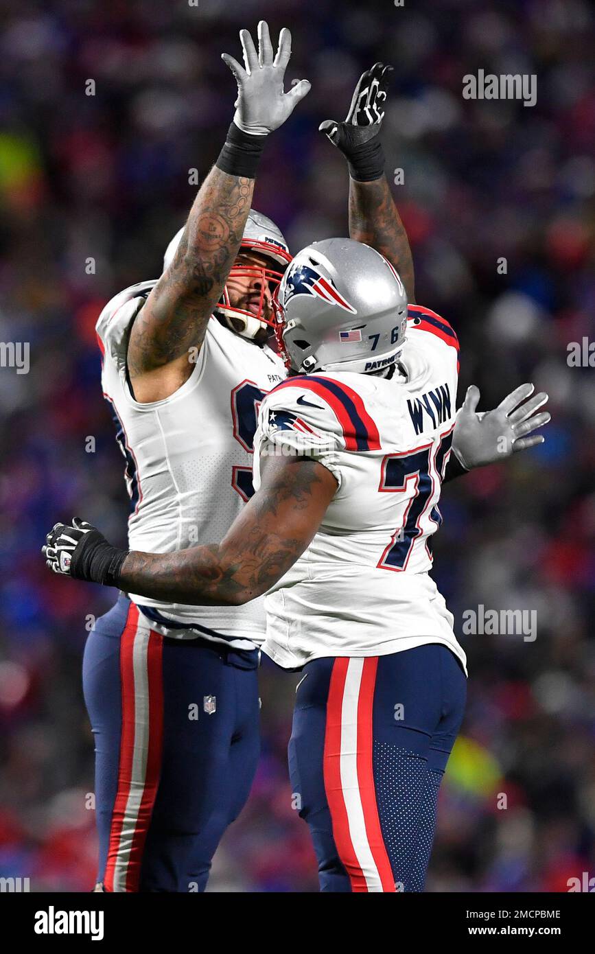 New England Patriots defensive end Lawrence Guy, left, and Isaiah