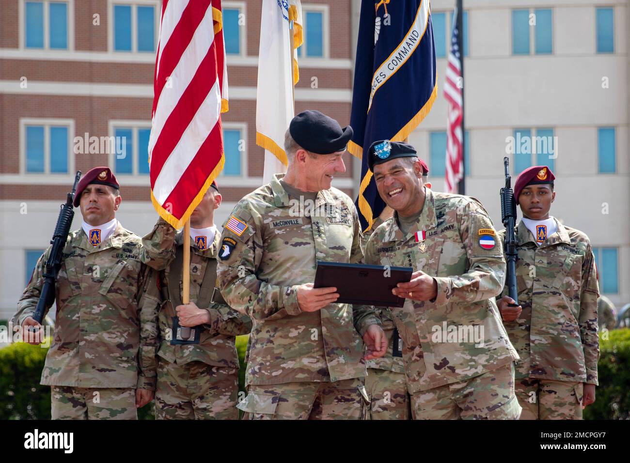 Gen. James C. McConville, 40th Chief of Staff of the Army, presents Gen. Michael X. Garrett, United State Army Forces Command (FORSCOM), outgoing Commanding General, with a certificate of appreciation from the President of the United States for service in the Armed Forces of the United States of America, on Fort Bragg, N.C. July 8, 2022. Garrett’s 38- year career culminated as the 23rd Commanding General for FORSCOM. Stock Photo