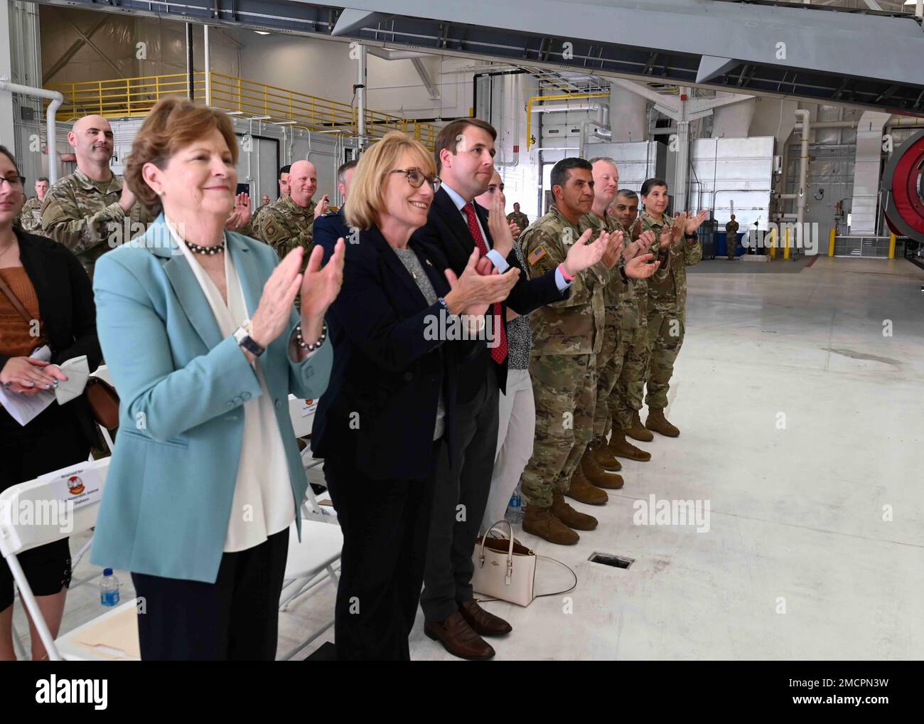 From left, a congressional delegation including Sen. Jeanne Shaheen, Sen. Maggie Hassan, and Rep. Chris Pappas applaud alongside senior New Hampshire National Guard leadership during the 64th Air Refueling Squadron assumption of command ceremony July 8, 2022, at Pease Air National Guard Base in Newington, New Hampshire. The 64th was originally assigned to Pease in 2009 in support of the KC-135 Stratotanker, which was divested in 2019. The unit returned to help support the Wing's new complement of a dozen KC-46A Pegasus refuelers. The 64th is expected to grow to 160 Airmen by December 2023. Stock Photo