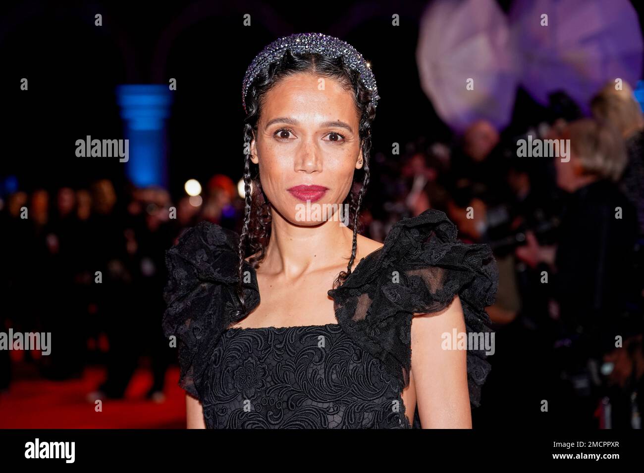 Robinson poses for photographers upon arrival at the British