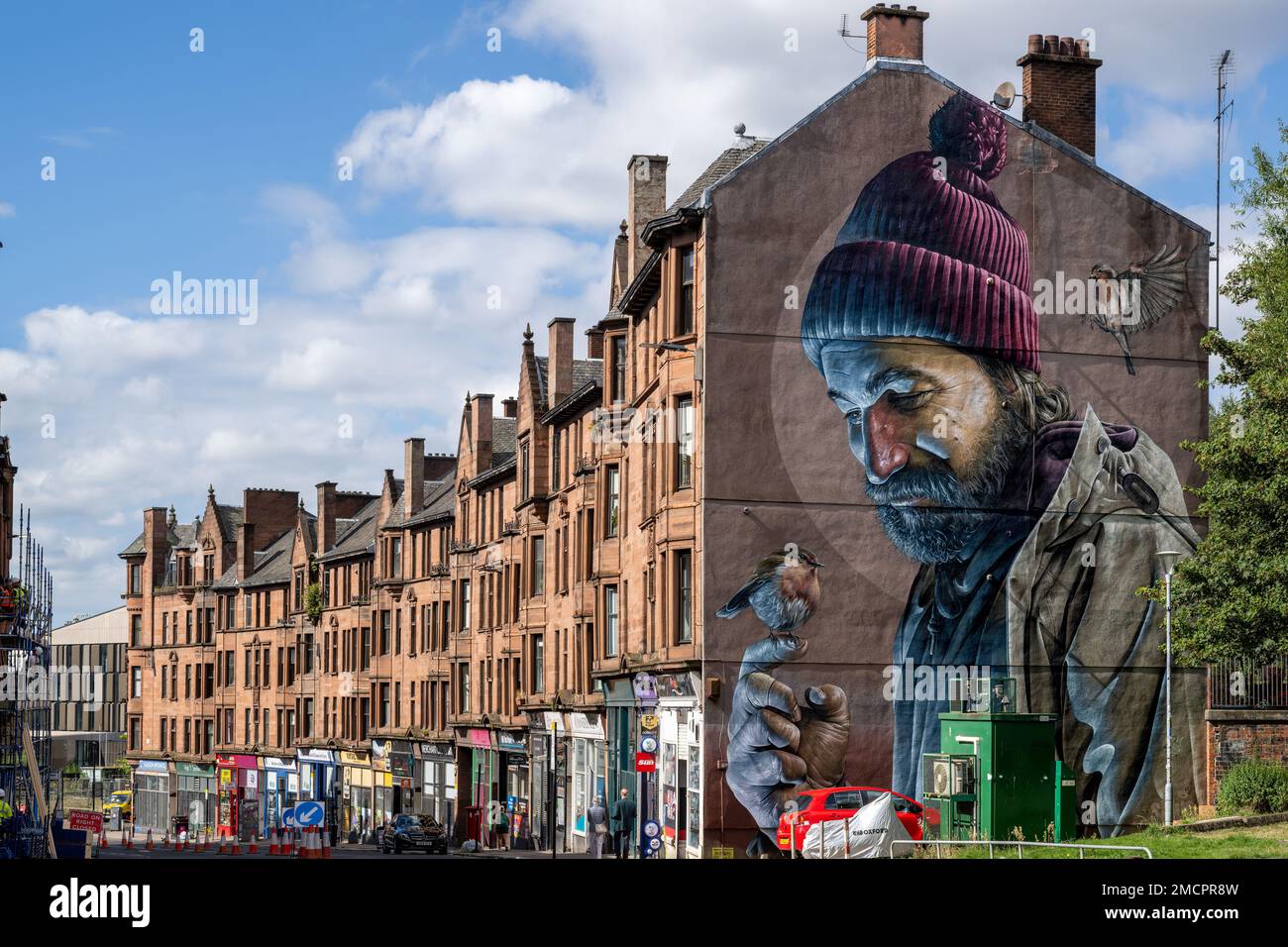 Smug's giant, untitled, mural of 'Saint Mungo'. Completed in 2016 the mural adorns the whole of the gable end of 287 High Street in Glasgow Stock Photo