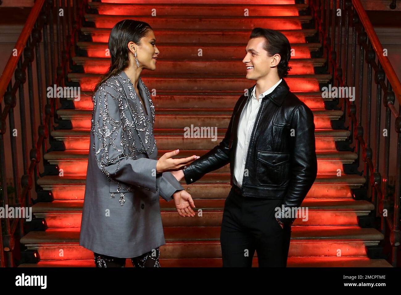 Tom Holland, right, and Zendaya pose for photographers at the photo
