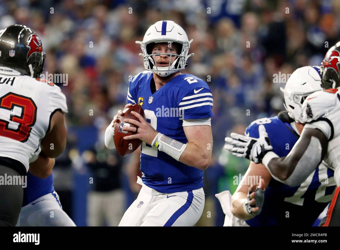Indianapolis Colts quarterback Carson Wentz looks to pass against the