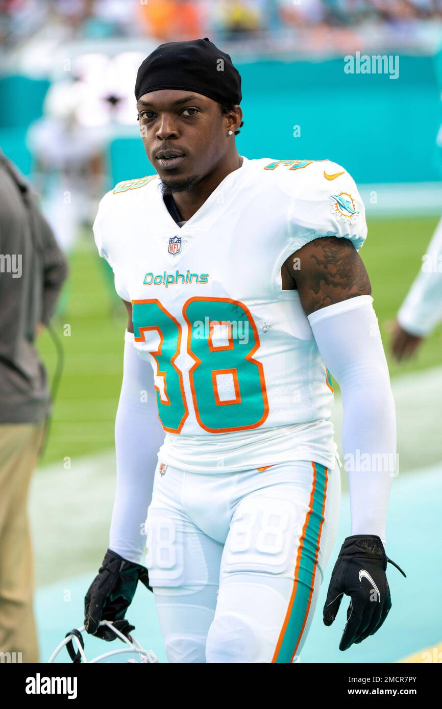 MIAMI GARDENS, FL - DECEMBER 25: Miami Dolphins wide receiver Trent  Sherfield (14) flexes in celebra