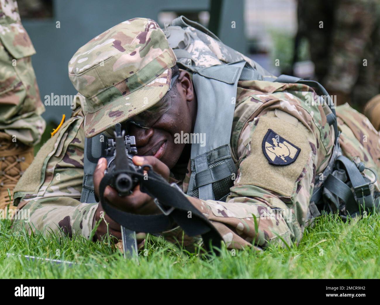 New Cadets practice aiming an M4 Carbine in the prone position at The
