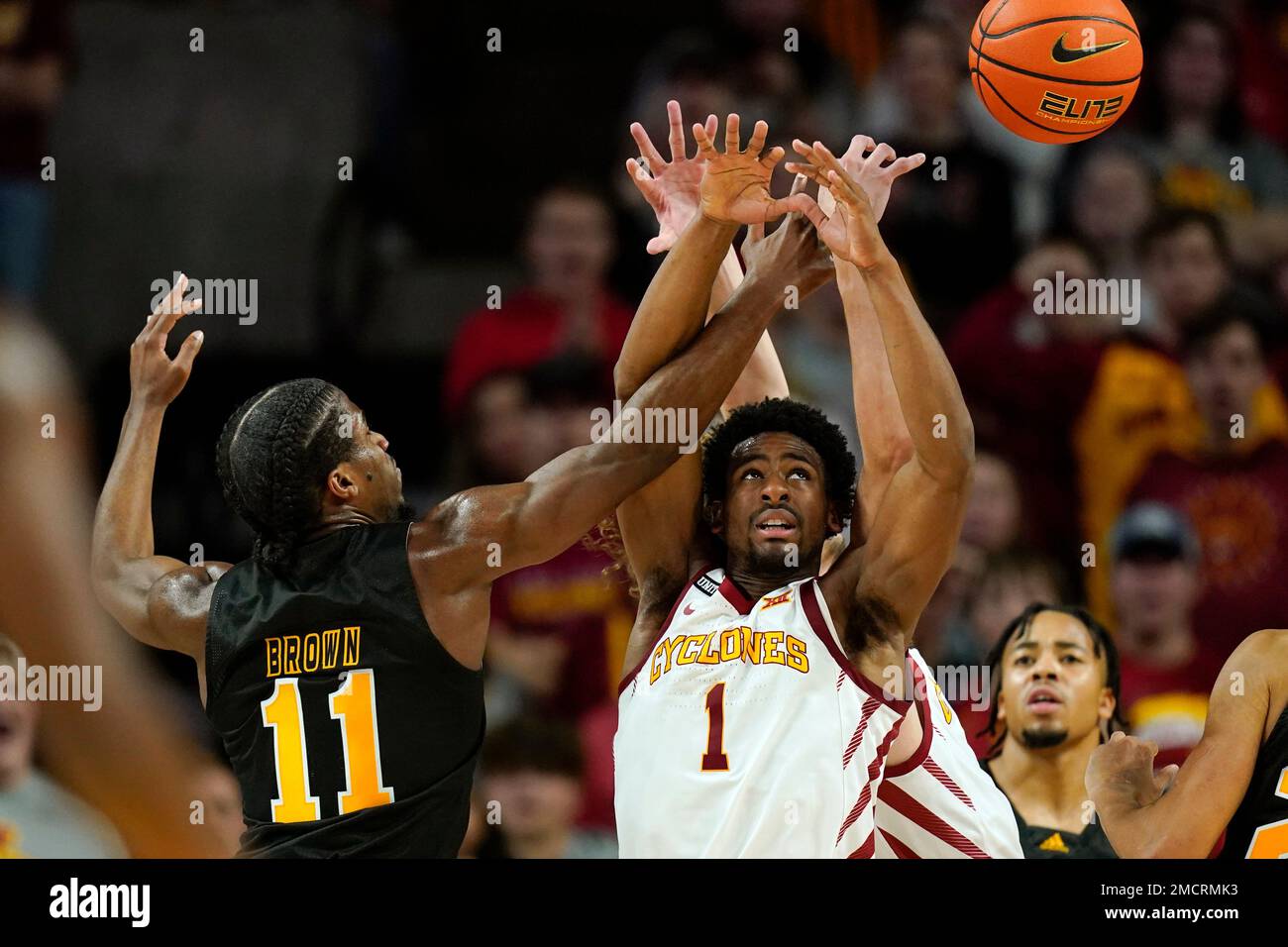 Iowa State guard Izaiah Brockington (1) fights for a rebound with