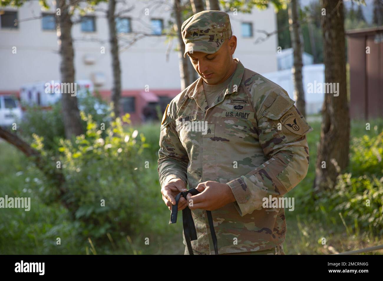 Sgt. John Bighamian, 11th Airborne Division, retrains himself on basic