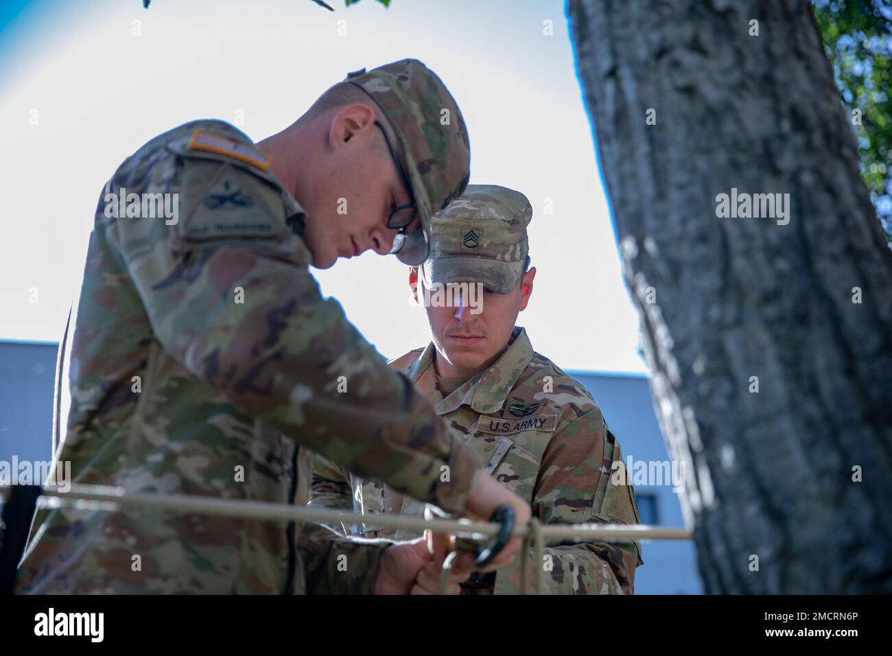 Staff Sgts. Scott Hepler and Leon Bingaman, 11th Airborne Division
