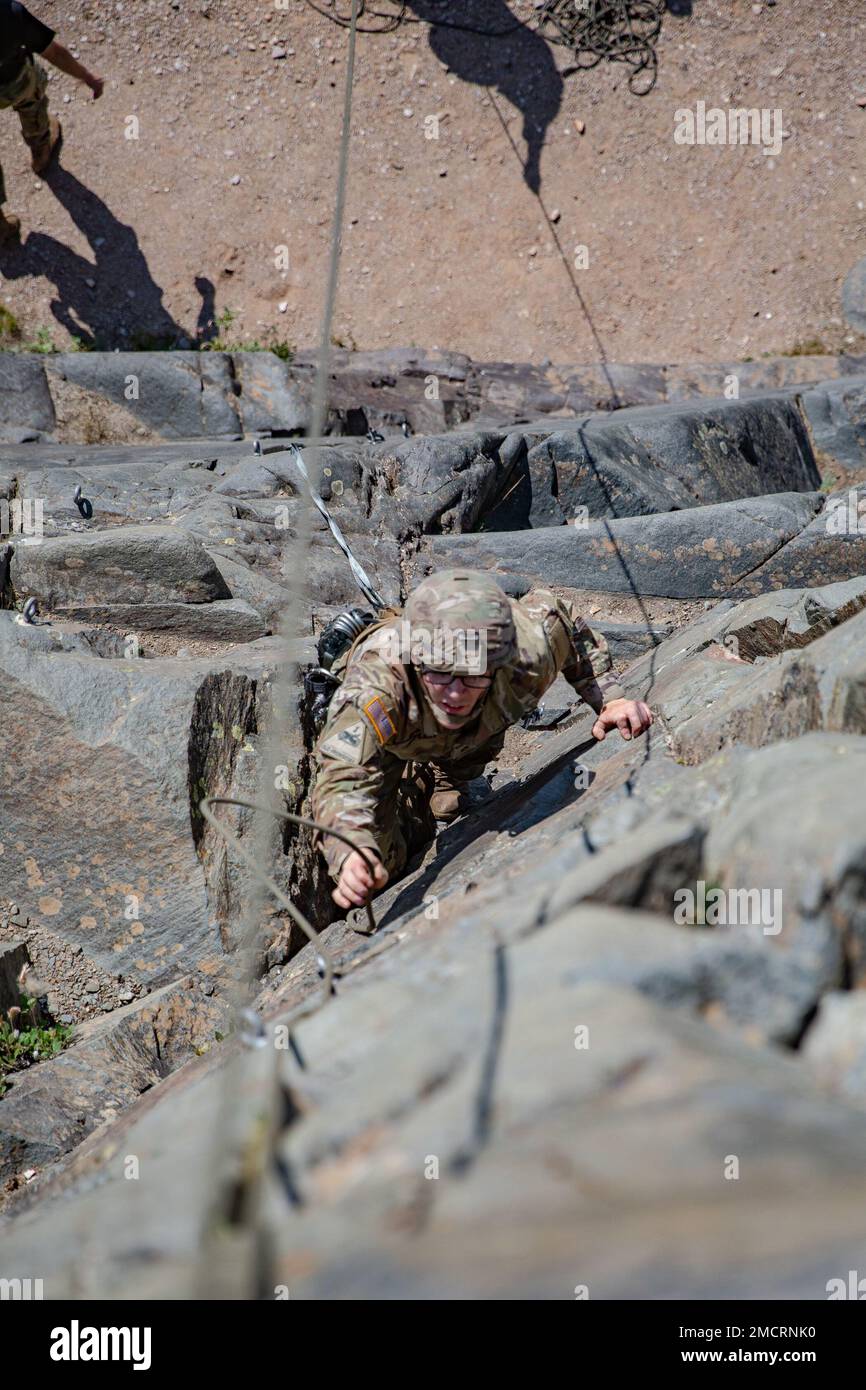 Military Climbing Ropes Training Staff Sgt. Scott Hepler learns how to place artificial protection ...
