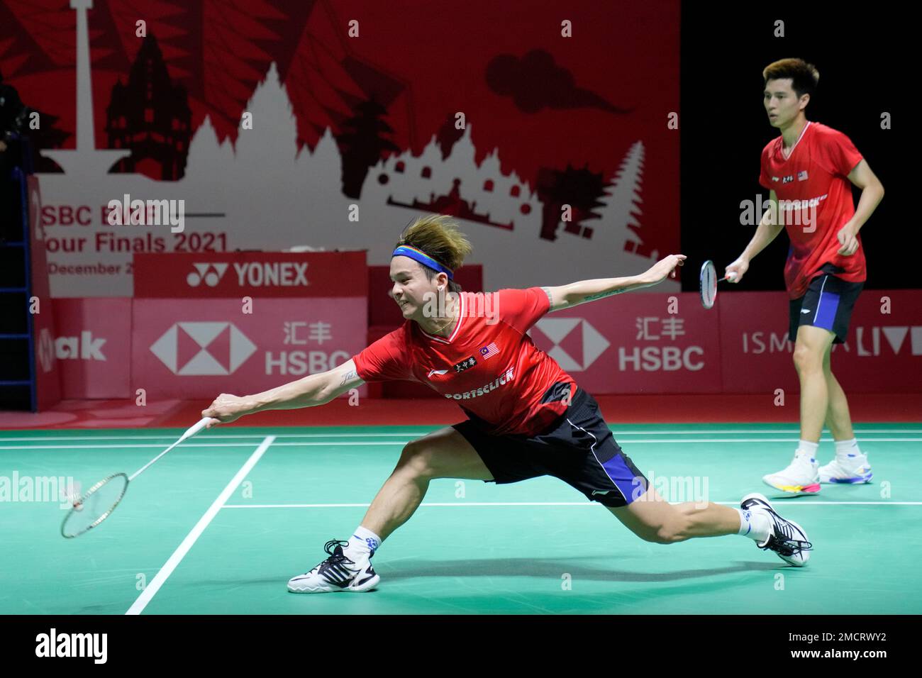 Malaysias Ong Yew Sin, right, and Teo Ee Yi compete against France Christo and Toma Junior Popov during their mens doubles Group B badminton match at the BWF World Tour Finals in