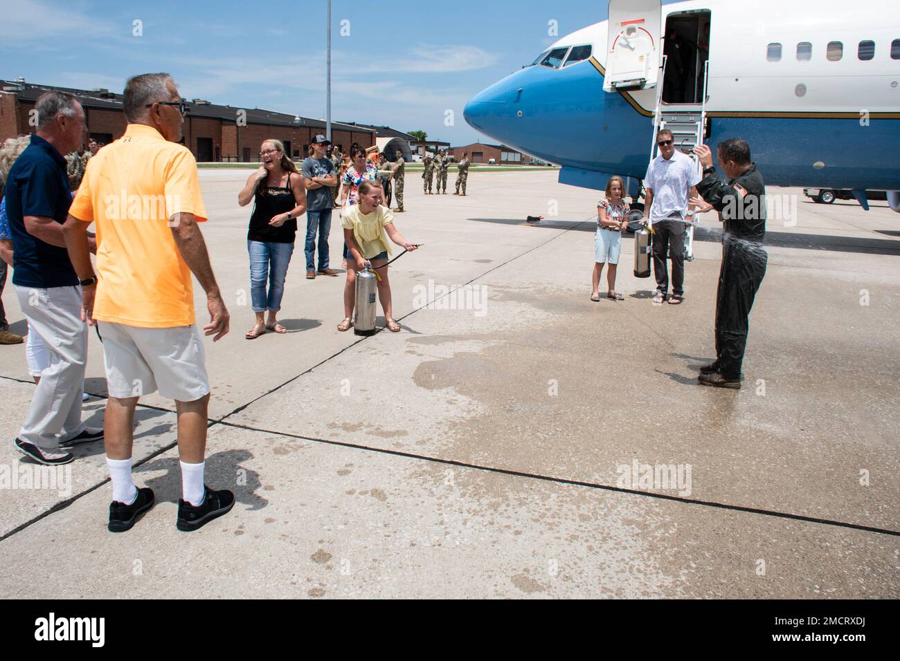 Lt. Col. Brandon Lorton, 73rd Airlift Squadron commander, celebrates ...