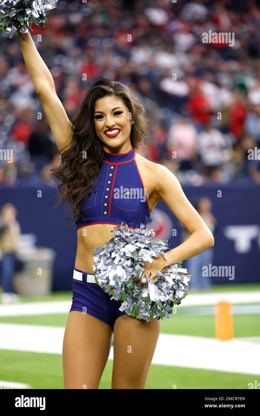 A Houston Texans cheerleader wearing a salute to service uniform