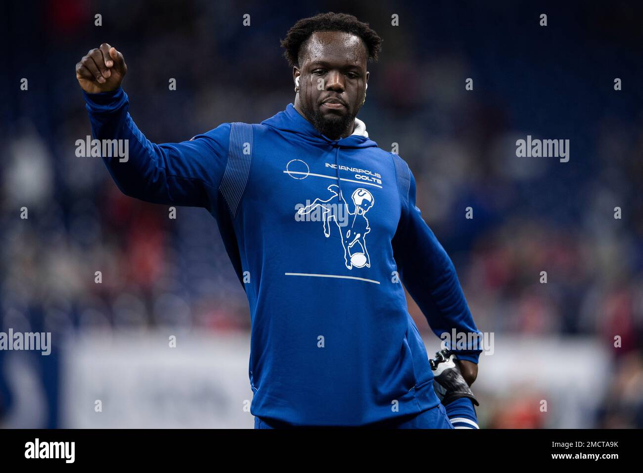 Indianapolis Colts defensive end Kwity Paye (51) warms up on the field  before an NFL football game against the Tampa Bay Buccaneers, Sunday, Nov.  28, 2021, in Indianapolis. (AP Photo/Zach Bolinger Stock