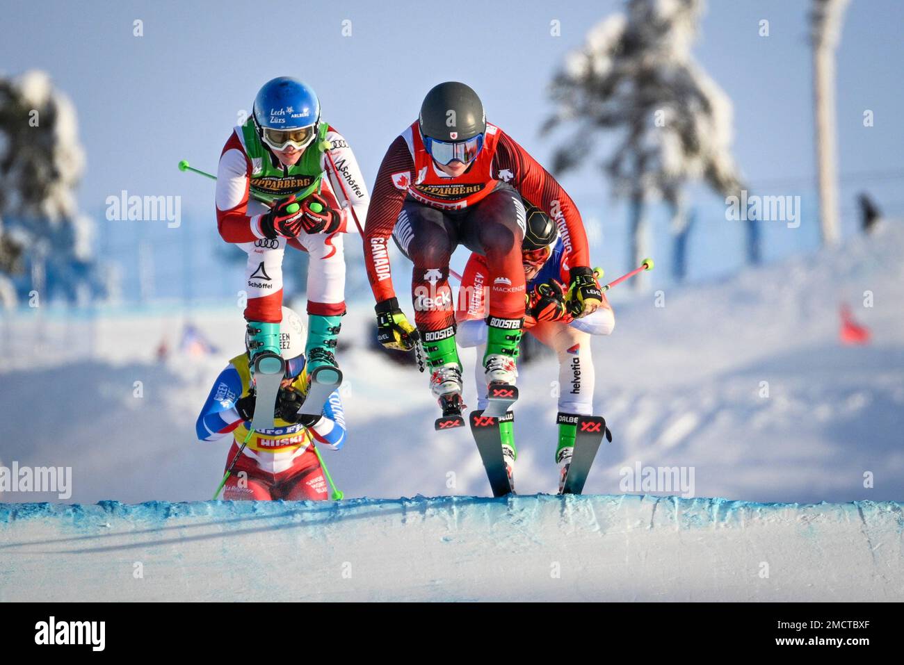 Canada's Tiana Gairns (red), Austria's Sonja Gigler (green), France's Marielle Berger Sabbatel (yellow) and Switzerland's Sixtine Cousin (blue) in action during the women's Ski Cross Small final of the FIS Freestyle Skiing World Cup in Idre, Sweden, on Jan. 22, 2023.Photo:  Anders Wiklund / TT / code 10040 Stock Photo